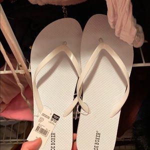 Brand new white flip flops size 9/10